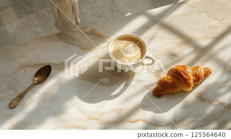 Cappuccino with latte art and a croissant on a marble table with window shadows. Simple and elegant breakfast scene in soft light AI generated 125564640