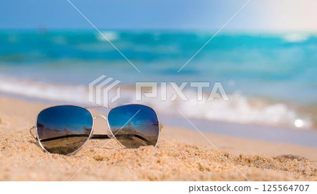 Beach and sunglasses Beach and sunglasses 125564707
