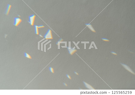 Crystal light reflections for overlay mockup on light background. Abstract prism reflection, rays leaking through lens effect. Rainbow holographic shadow mock up, iridescent wallpaper Crystal light reflections for overlay mockup on light background. Abstract prism reflection, rays leaking through lens effect. Rainbow holographic shadow mock up, iridescent wallpaper 125565259