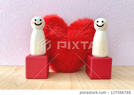 Two smiling lovers and a heart Two smiling lovers and a heart 125566788