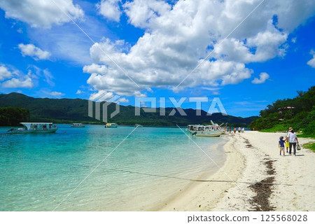 A boat floating in Kabira Bay 125568028