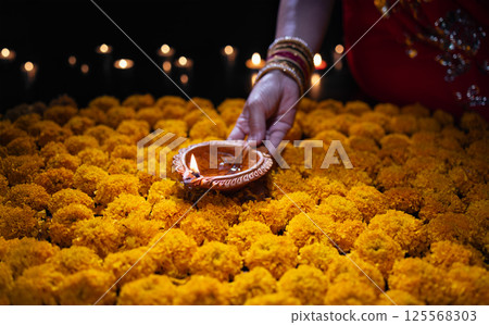 Diwali Traditions and Celebrations Around the World. 125568303