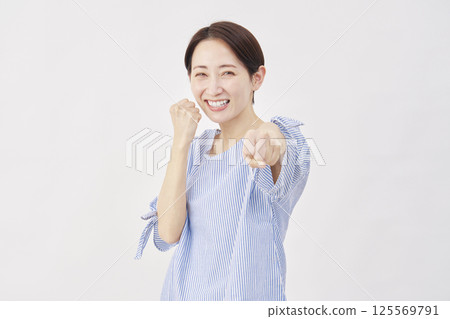 Woman middle age punch white background 125569791
