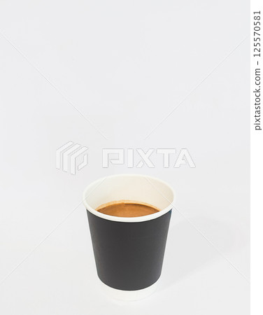 Americano coffee in black paper cup isolated on white background. 125570581