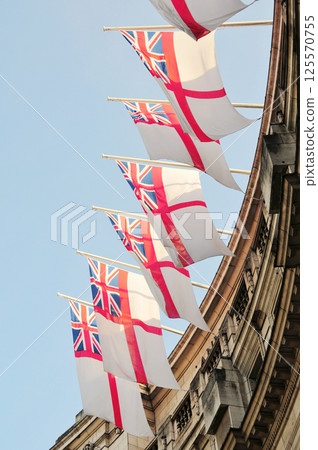 A row of English flags on buildings in London, England 125570755