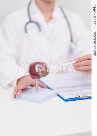 Doctor with human Liver anatomy. Elderly Patient consultation medical health for Liver cancer and Tumor, Jaundice, Viral Hepatitis, Cirrhosis, Failure, Enlarged, Hepatic Encephalopathy, Ascites Fluid 125570946