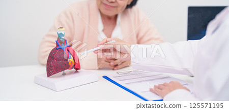 Doctor with Respiratory system. Elderly Patient consultation medical health for Lung Cancer, Asthma, Chronic Obstructive Pulmonary, Bronchitis, Emphysema, Cystic Fibrosis, Bronchiectasis, Pneumonia 125571195