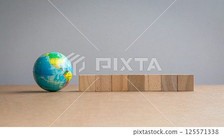 Globe with seven square blocks 125571338