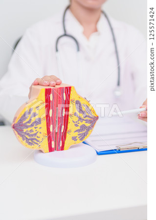 woman Patient consultation with doctor for Breast Augmentation Surgery, October Breast Cancer Awareness month, implant, Diagnosis, Beauty woman enlargement and medical healthcare concept 125571424