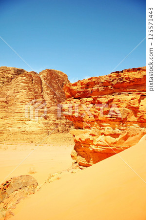 The landscape of the Wadi Rum desert in Jordan where the most Mars like terrain on earth. The landscape of the Wadi Rum desert in Jordan where the most Mars like terrain on earth. 125571443