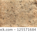 Rough gold textured background with natural cracks and scratches. Ideal for luxury designs, vintage projects, packaging, branding, invitation 125571684