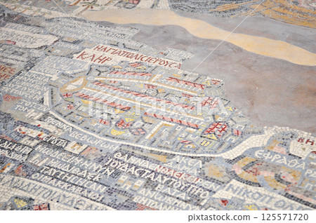 The ancient and incomplete mosaic map of Jerusalem is on the ground 125571720