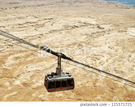 Photo of a cable car in massada, Israel Photo of a cable car in massada, Israel 125571725