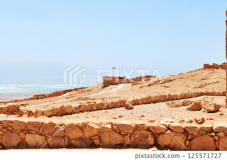The ruins of the ancient city of the state of Masada,israel The ruins of the ancient city of the state of Masada,israel 125571727