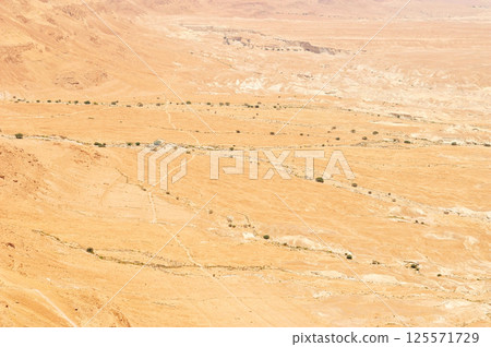 Desert by the Dead Sea in Masada, Israel Desert by the Dead Sea in Masada, Israel 125571729