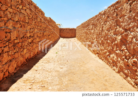 The ruins of the ancient city of the state of Masada,israel The ruins of the ancient city of the state of Masada,israel 125571733