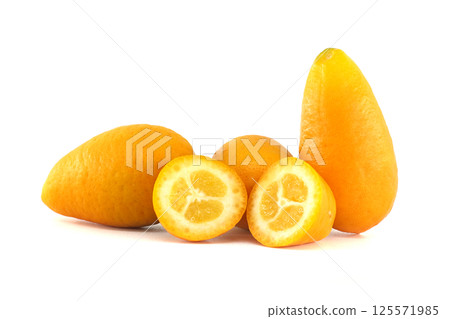 Close-Up of Fresh Kumquats Sliced to Reveal Juicy Inner Flesh 125571985