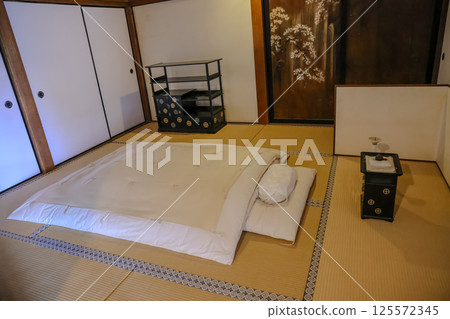 March 23 2025 Traditional Japanese Bedroom with Futon and Tatami Mats for Relaxation 125572345