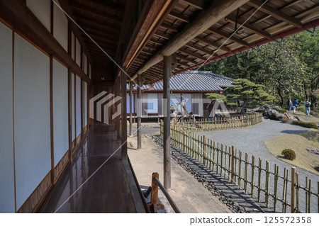March 23 2025 a Traditional Japanese House with Wooden Veranda, Japan March 23 2025 a Traditional Japanese House with Wooden Veranda, Japan 125572358