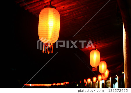 traditional Chinese style corridor, with traditional Chinese lanterns hanging under the eaves, Zhejiang Province, China 125572455