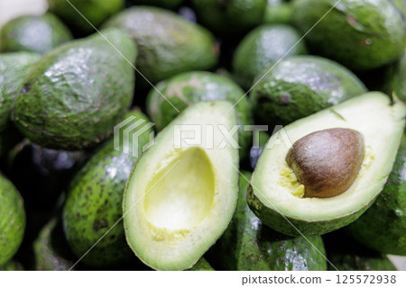 Harvested avocados 125572938