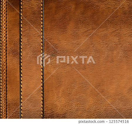 Horizontal or vertical leather background of brown colors with decorative braided edging. Decorative backdrop with cowhide texture and braided edge. Copy space for text 125574516
