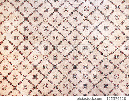 Ancient byzantine natural stone tile mosaic with geometric pattern, Mount Nebo, Jordan, Middle East. Horizontal background with detail of ancient mosaic walls with stone details and tile ornament Ancient byzantine natural stone tile mosaic with geometric pattern, Mount Nebo, Jordan, Middle East. Horizontal background with detail of ancient mosaic walls with stone details and tile ornament 125574528