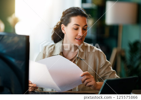 woman working at home woman working at home 125575866