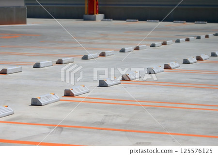 Concrete paved parking lot 125576125