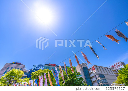 Yokohama cityscape in Japan - View of carp streamers in front of the subway "Center Minami Station" 125576527