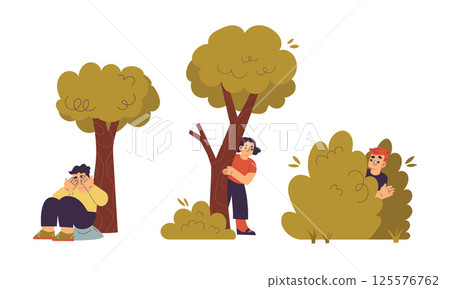People are joyfully interacting within a vibrant nature scene filled with trees and bushes 125576762