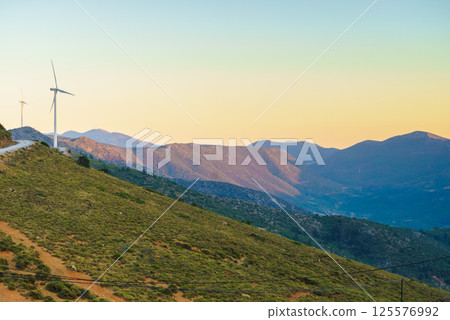 Windmills on Greek hills 125576992