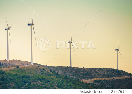 Windmills on Greek hills 125576993