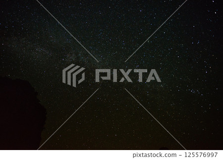 Stars on dark night sky 125576997