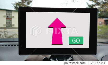 navigator with arrow sign on screen 125577351