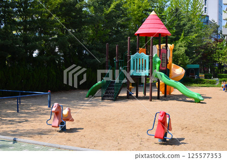 colorful playground in the park colorful playground in the park 125577353