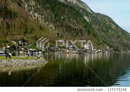 Hallstatt Austria. Alpine Village Reflecting in Mountain Lake 125578246