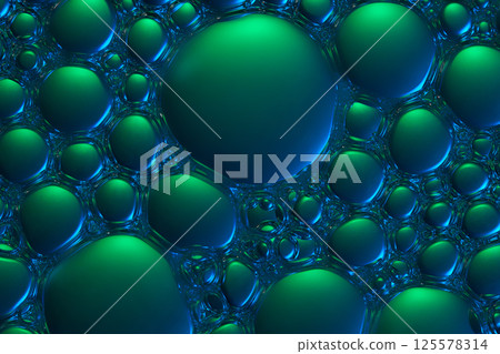 Collection of bubbles formed on the surface of liquid, sticking together to form the thick texture of essence. The gradient green light shines on the bubbles, creating a hazy color effect. 125578314