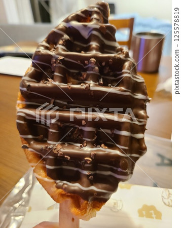 Chocolate waffle on a stick 125578819