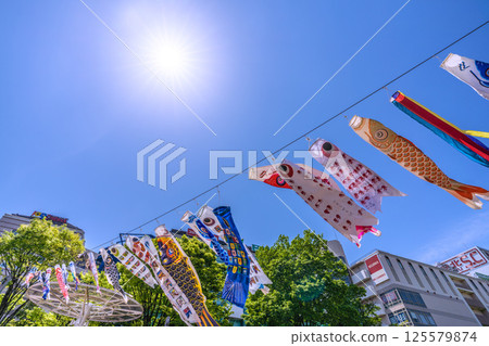 Yokohama cityscape in Japan - View of carp streamers in front of the subway "Center Minami Station" 125579874