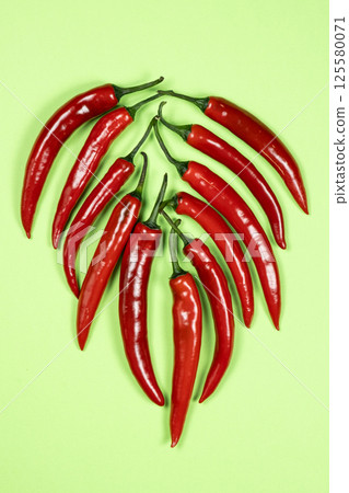 Assortment of Hot Peppers in Close-Up Top View Assortment of Hot Peppers in Close-Up Top View 125580071