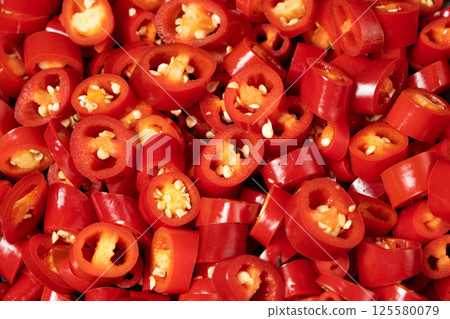 Chopped Fresh Red Hot Chili Close-Up. 125580079