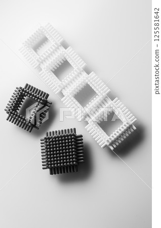 Children's construction set in black and white photo. Educational toy for children. 125581642