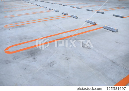 Concrete paved parking lot 125581697