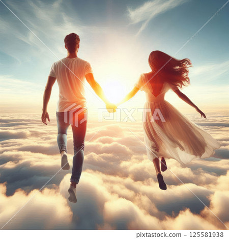 A couple in love running through the clouds towards the sun. 125581938