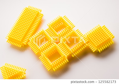 Puzzle for young children. Close up of a children's educational construction set. 125582173