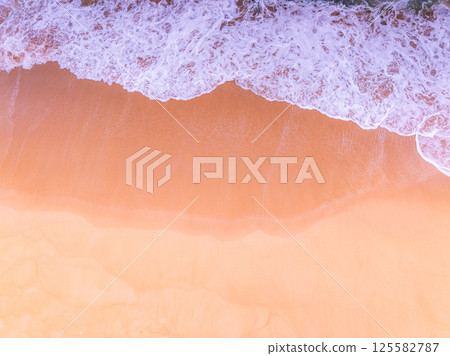 Beautiful beach waves landscape view,Beautiful waves crashing on sandy shore nature beach background Beautiful beach waves landscape view,Beautiful waves crashing on sandy shore nature beach background 125582787