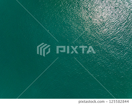 Aerial view beautiful sea surface nature background,Amazing waves texture ocean sea background 125582844