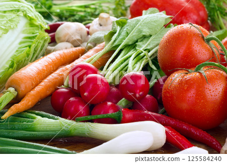 Vegetables on cutting board 125584240