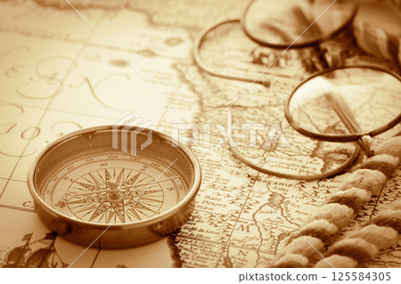 Compass with vintage map Compass with vintage map 125584305